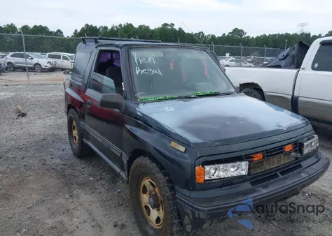 1995 Geo Tracker from USA, damaged, VIN 2CNBE18U0S6943292